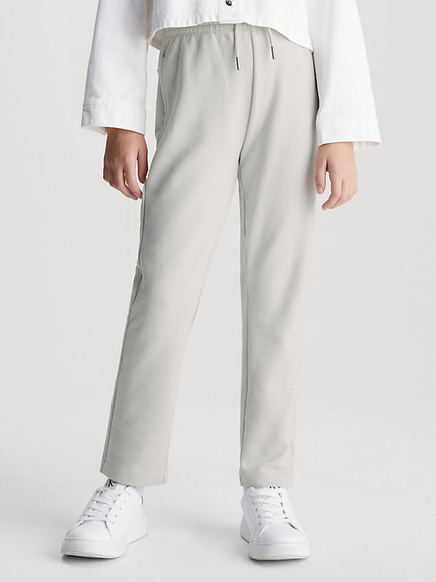 grey dziecięce spodnie dresowe z materiału frotte z logo dla dzieci unisex - calvin klein jeans