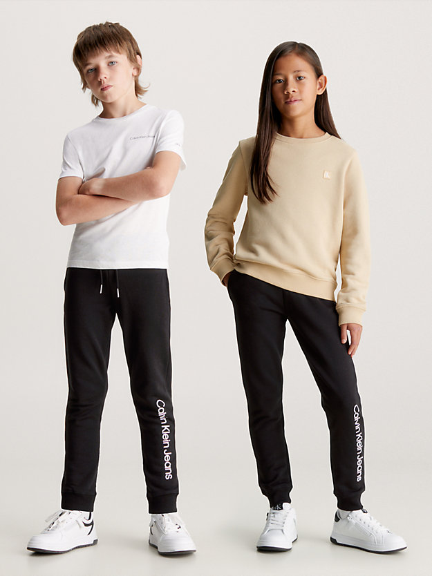 ck black dziecięce spodnie dresowe z materiału frotte z logo dla dzieci unisex - calvin klein jeans