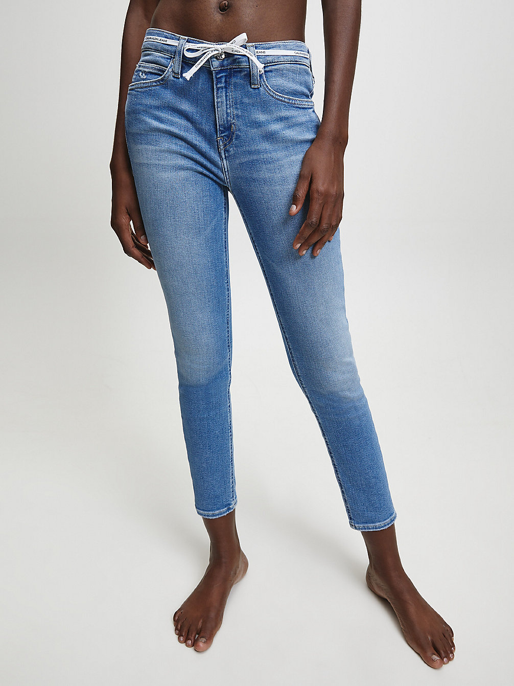AB052 LIGHT BLUE LOGO LACE Mid Rise Skinny Enkellange Jeans undefined dames Calvin Klein