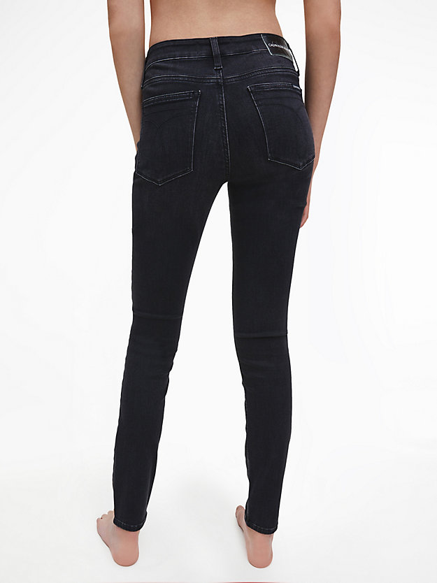 ZZ002 WASHED BLACK Mid Rise Skinny Jeans de mujer CALVIN KLEIN JEANS