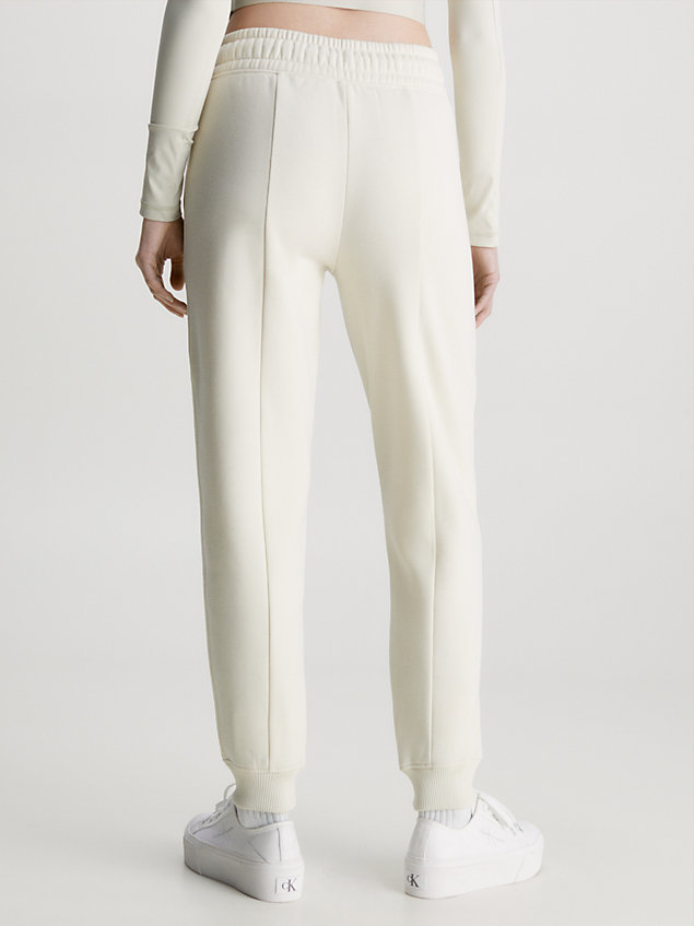 pantalon de jogging relaxed avec logo tape beige pour femmes calvin klein jeans