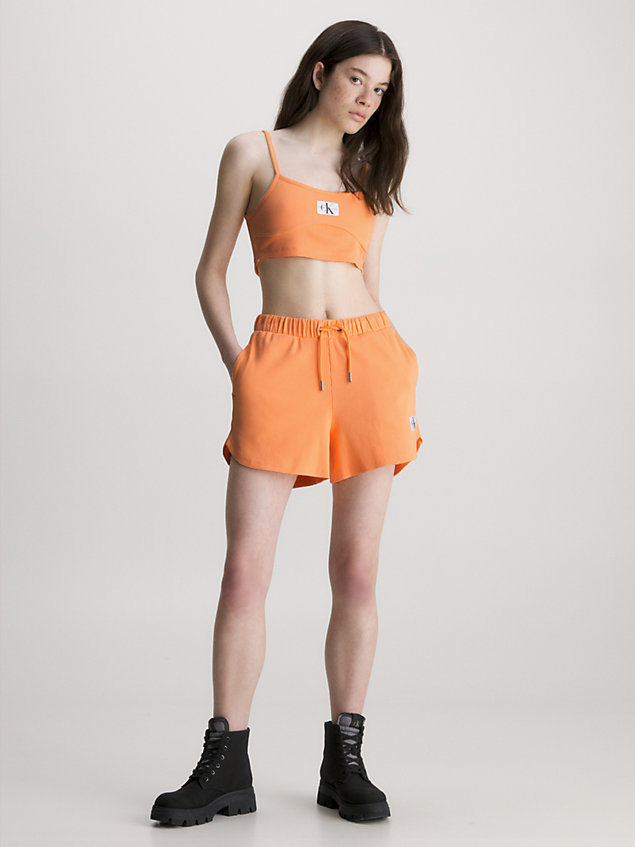 orange swobodne dżersejowe szorty z prążkowanego materiału dla kobiety - calvin klein jeans