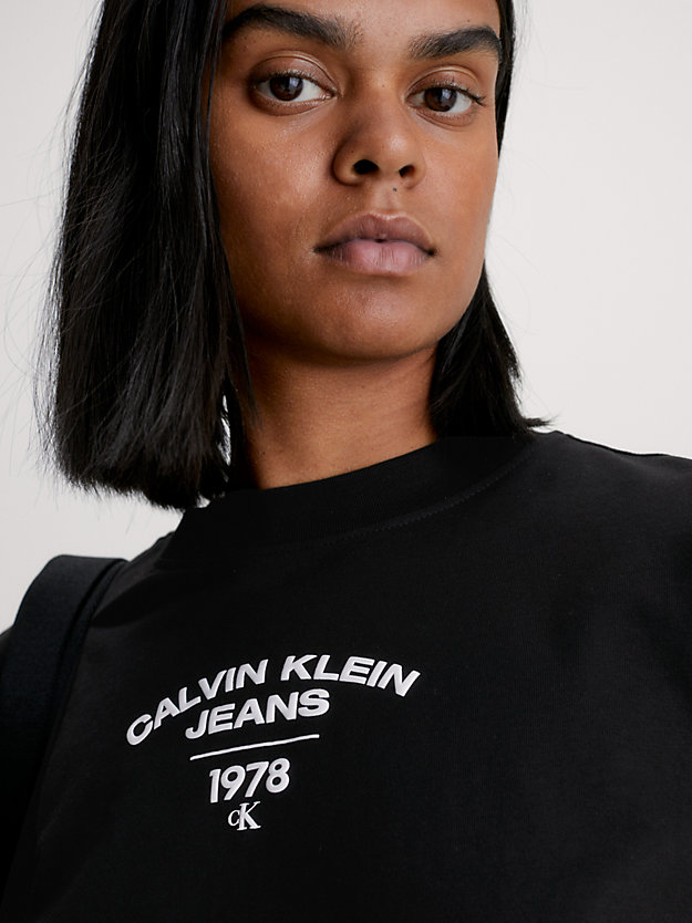 CK BLACK T-shirt slim con logo in stile college da donna CALVIN KLEIN JEANS