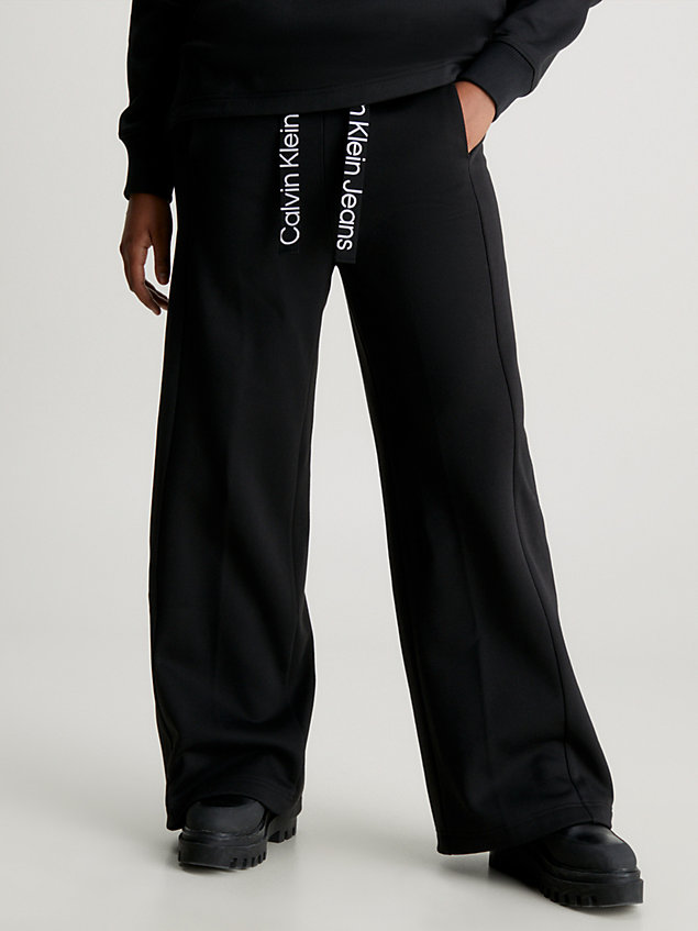 black logo tape-jogginghose mit weitem bein für damen - calvin klein jeans
