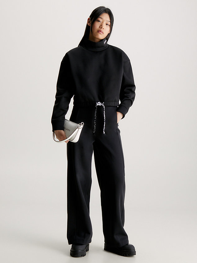black spodnie dresowe z szerokimi nogawkami i taśmą z logo dla kobiety - calvin klein jeans