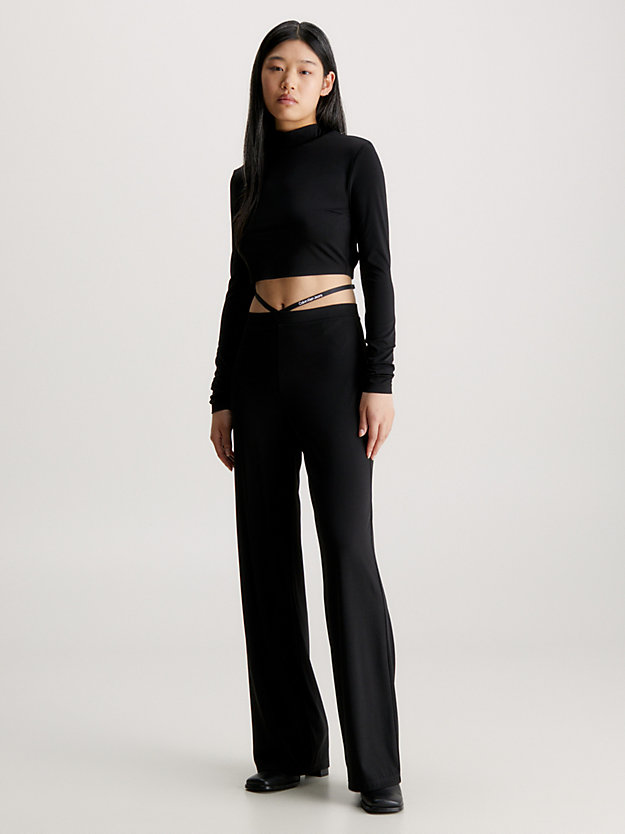 ck black strap detail flared jersey trousers for women calvin klein jeans