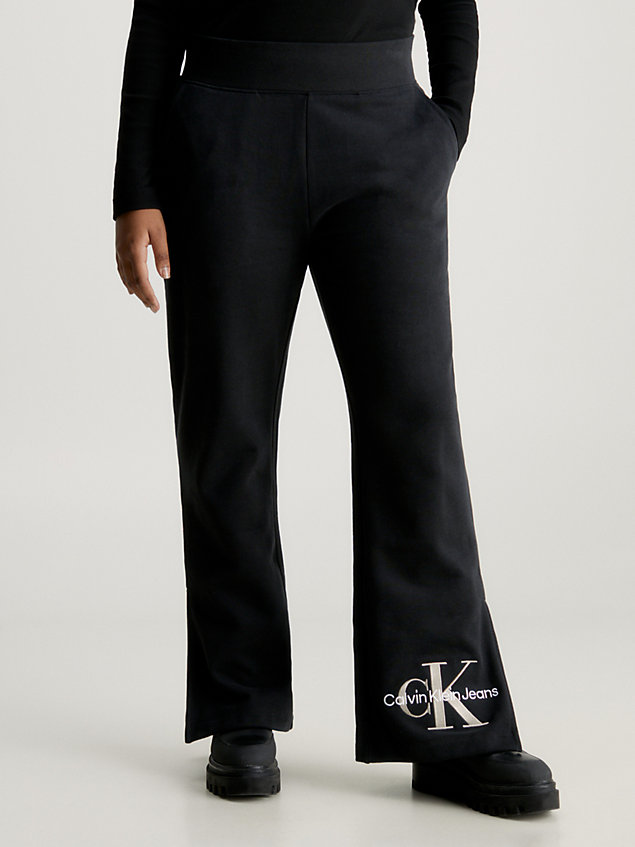 black organiczne spodnie dresowe z rozcięciami na dole dla kobiety - calvin klein jeans