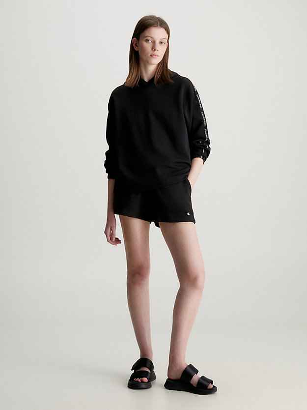 ck black relaxed hoodie met logo tape voor dames - calvin klein jeans