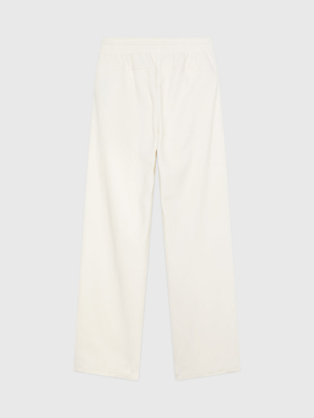 white polarowe spodnie dresowe z szerokimi nogawkami dla kobiety - calvin klein jeans