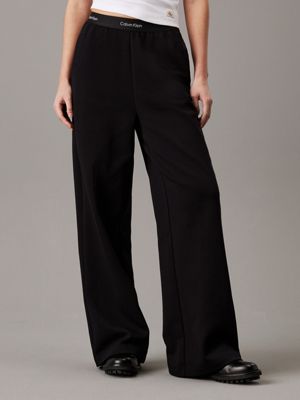 ck black logo tape wide leg trousers for women calvin klein jeans