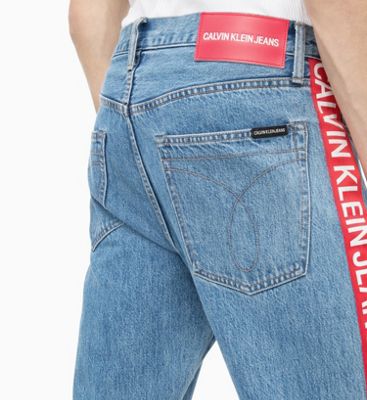 ckj 035 straight taped jeans