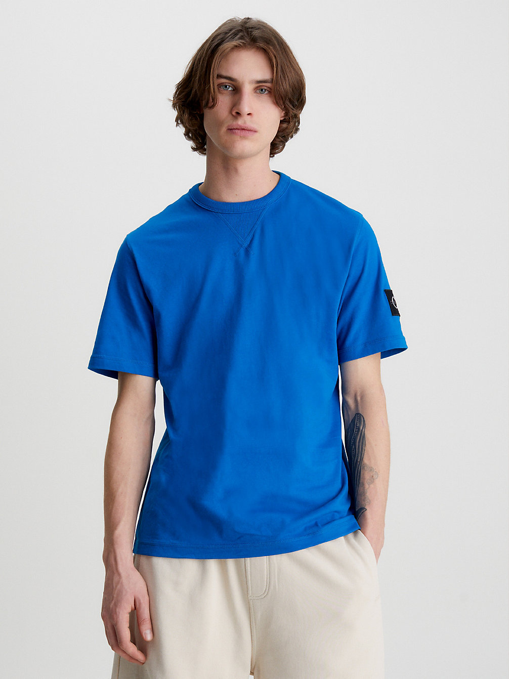 T-Shirt Con Stemma Monogramma > TARPS BLUE > undefined uomo > Calvin Klein