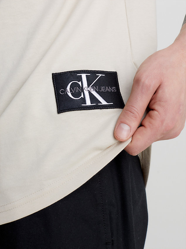 beige organic cotton badge t-shirt for men calvin klein jeans