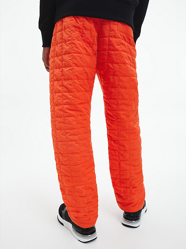 CORAL ORANGE Recycled Nylon Quilted Joggers for men CALVIN KLEIN JEANS