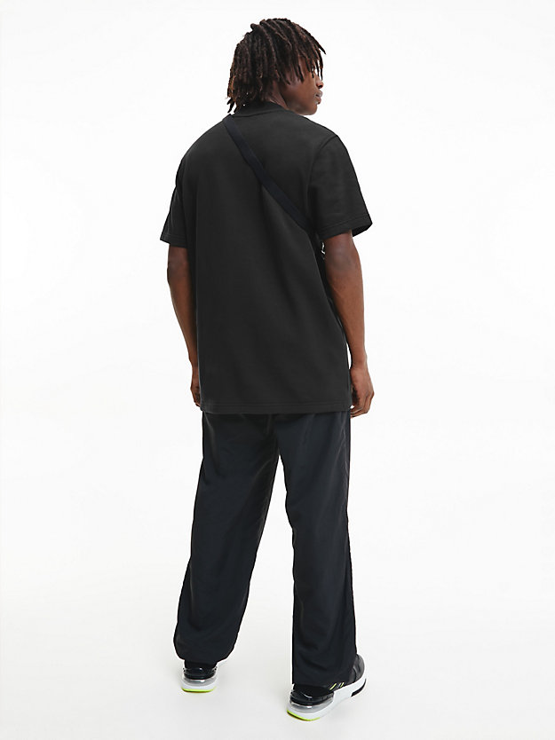 CK BLACK Relaxed Cotton Terry T-shirt for men CALVIN KLEIN JEANS