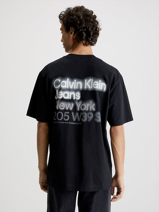 CK BLACK T-shirt con logo posteriore taglio relaxed da uomo CALVIN KLEIN JEANS