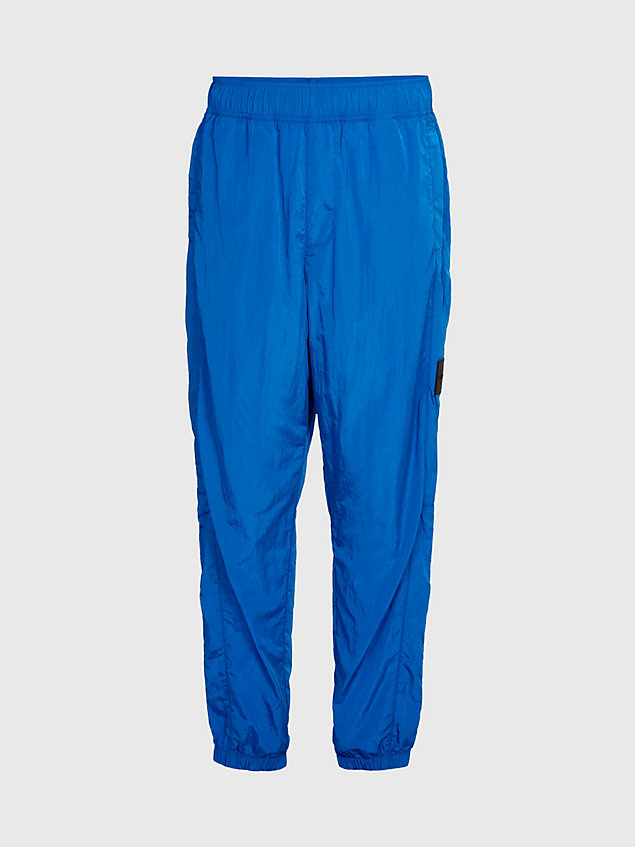 blue recycled nylon tapered trousers for men calvin klein jeans