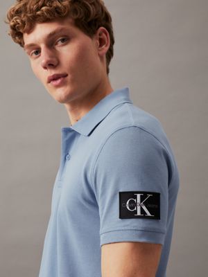 faded denim badge polo shirt for men calvin klein jeans