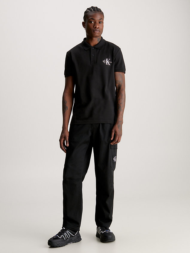 t-shirt a polo con monogramma black da uomo calvin klein jeans