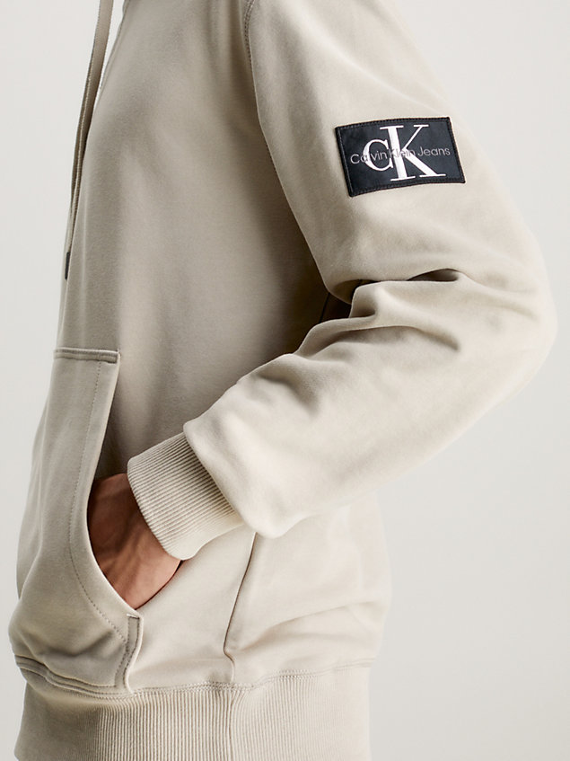 beige cotton badge hoodie for men calvin klein jeans