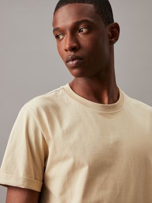 pale khaki cotton badge t-shirt for men calvin klein jeans