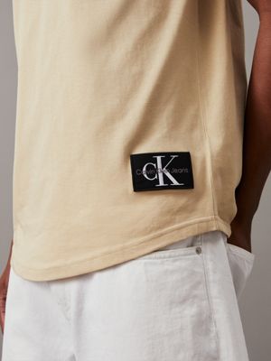 pale khaki cotton badge t-shirt for men calvin klein jeans