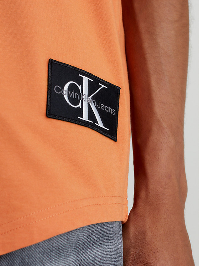 orange cotton badge t-shirt for men calvin klein jeans