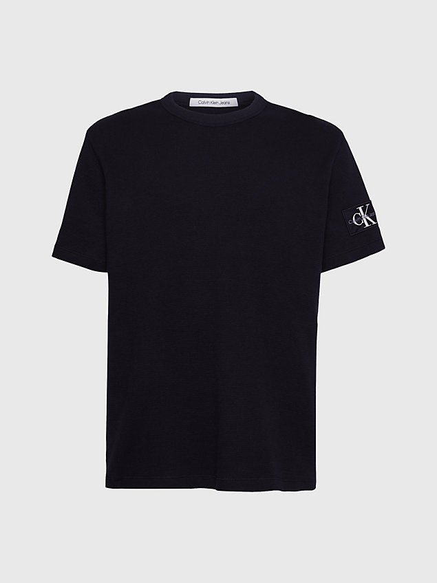 black t-shirt z waflowej bawełny z naszywką dla mężczyźni - calvin klein jeans