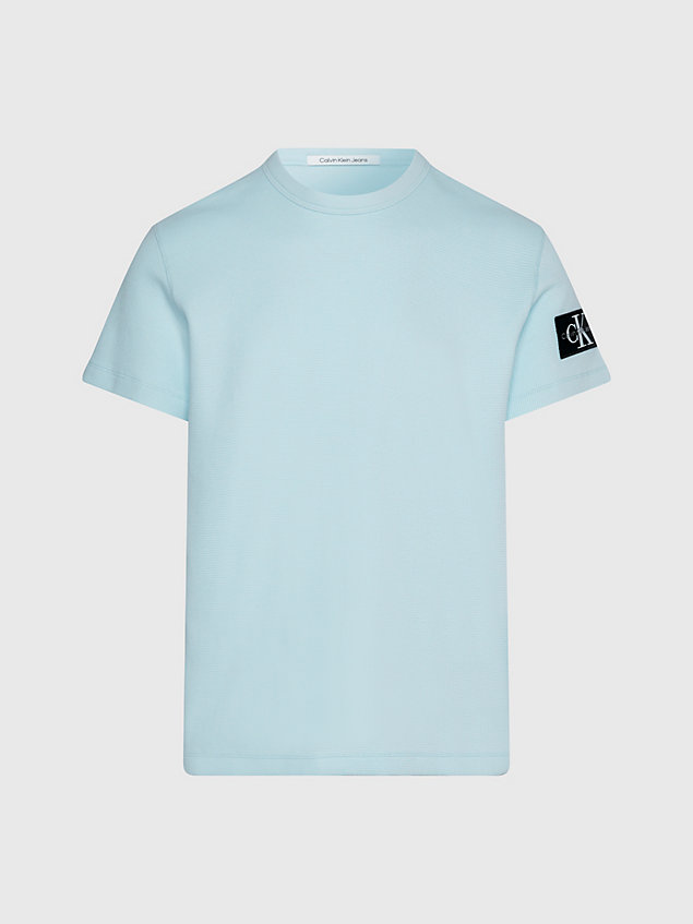 camiseta de algodón gofrado con insignia blue de hombre calvin klein jeans