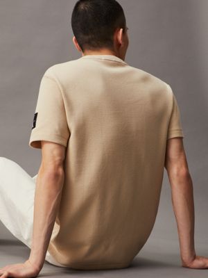 pale khaki waffle cotton badge t-shirt for men calvin klein jeans