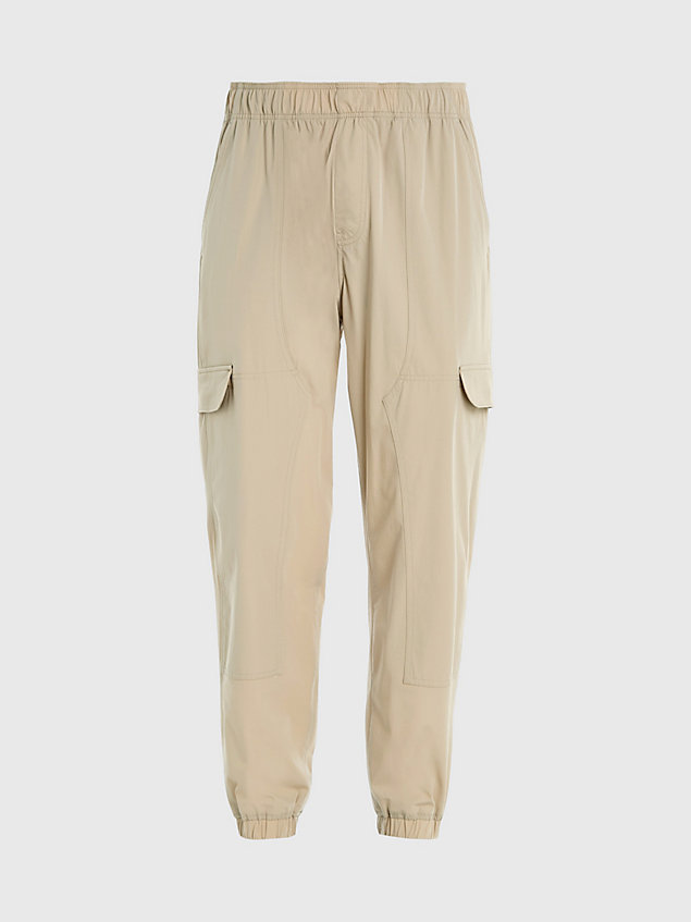 beige recycled nylon tapered cargo pants for men calvin klein jeans