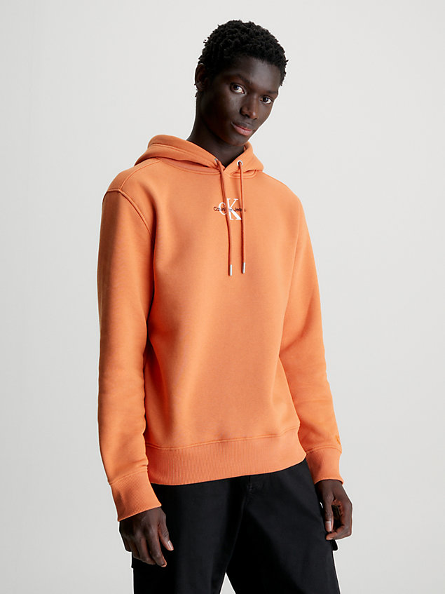 sweat-shirt à capuche en polaire avec monogramme orange pour hommes calvin klein jeans