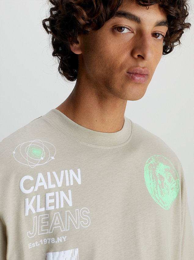 beige oversized multi logo t-shirt for men calvin klein jeans