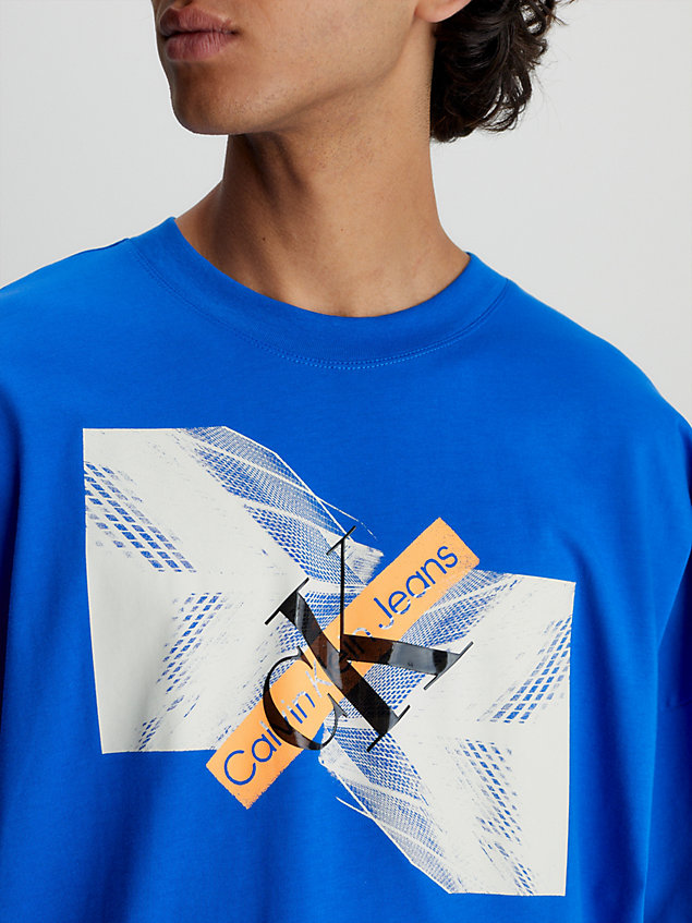 blue oversized graphic logo t-shirt for men calvin klein jeans