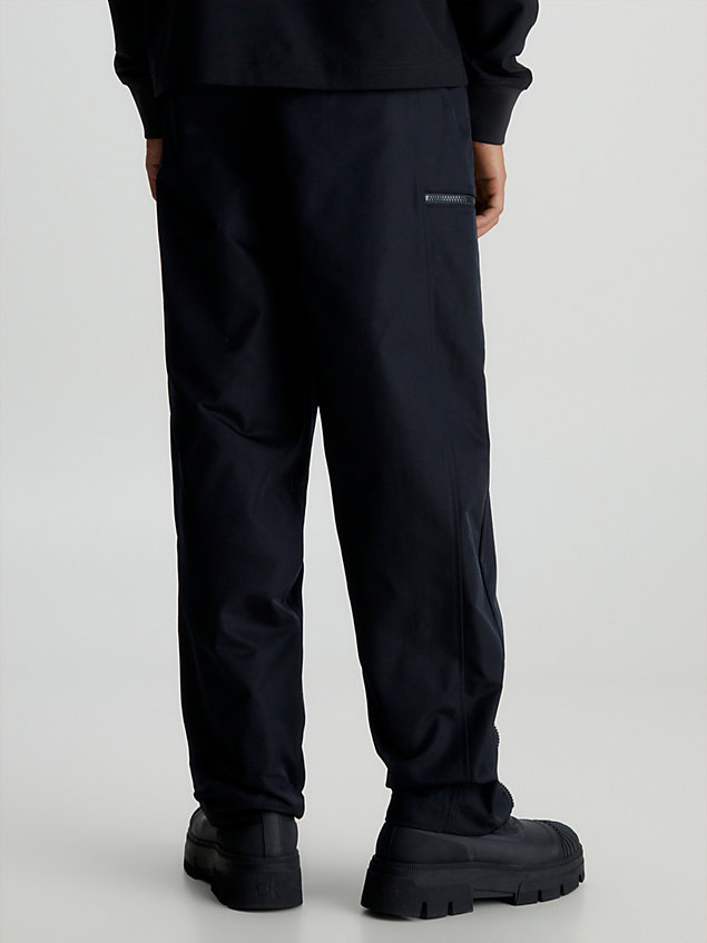 black relaxed zip cargo pants for men calvin klein jeans