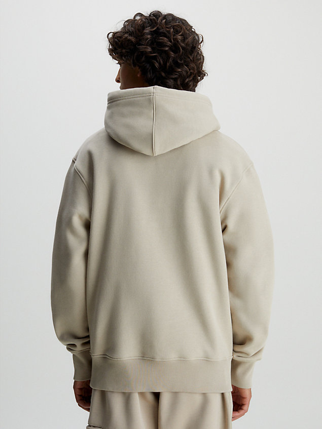 beige relaxed multi logo hoodie for men calvin klein jeans