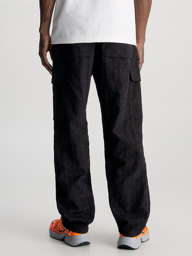 black relaxed textured nylon cargo pants for men calvin klein jeans