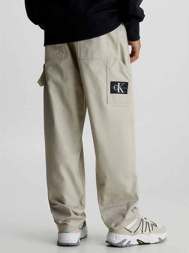 beige straight canvas utility trousers for men calvin klein jeans