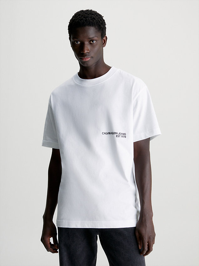white relaxed spray print t-shirt for men calvin klein jeans