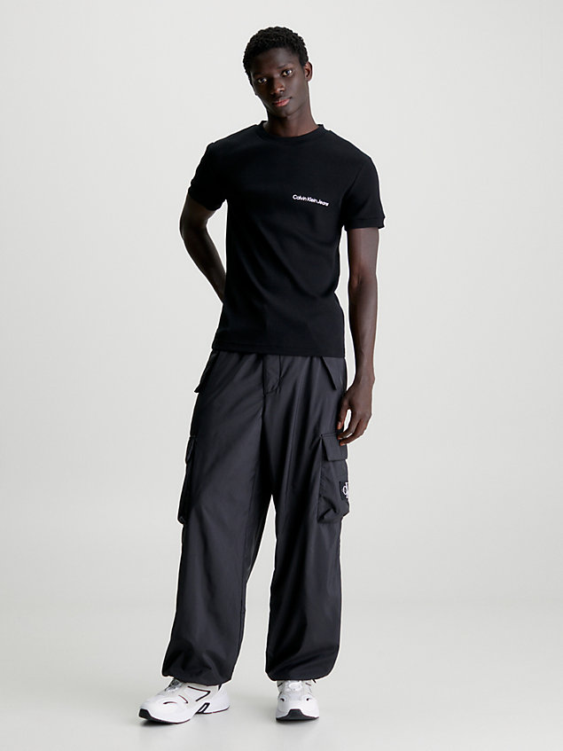 black wąski t-shirt ze ściągaczowej bawełny dla mężczyźni - calvin klein jeans