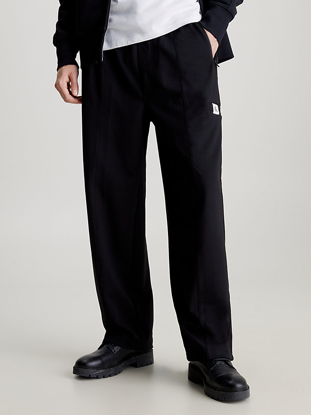 black spodnie dresowe frotte oversize dla mężczyźni - calvin klein jeans