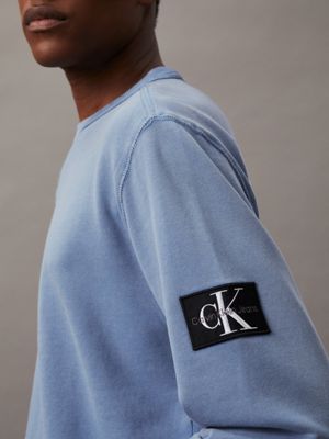 faded denim washed cotton badge sweatshirt for men calvin klein jeans