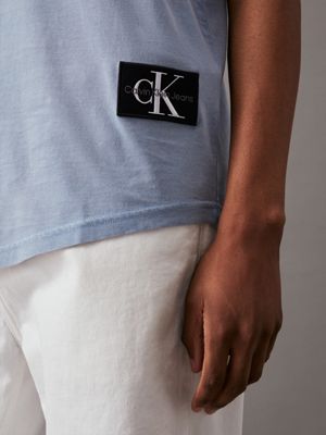 faded denim washed cotton badge t-shirt for men calvin klein jeans