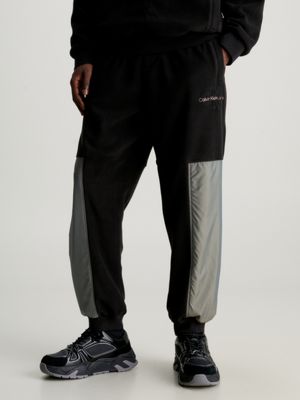 Calvin Klein MICRO LOGO - Tracksuit bottoms - grey tar/blue-grey