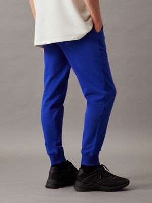 sapphire blue cotton terry joggers for men calvin klein jeans