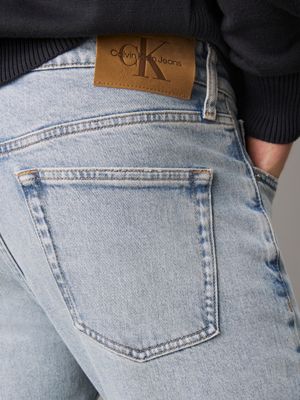 jean slim tapered denim light pour hommes calvin klein jeans