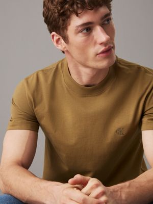 t-shirt con monogramma in jersey pesante gothic olive da uomini calvin klein jeans