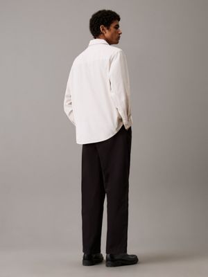 black relaxed cropped cotton trousers for men calvin klein jeans