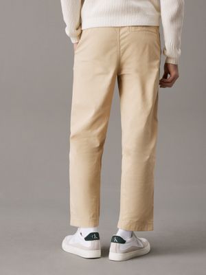 pale khaki straight cropped twill trousers for men calvin klein jeans