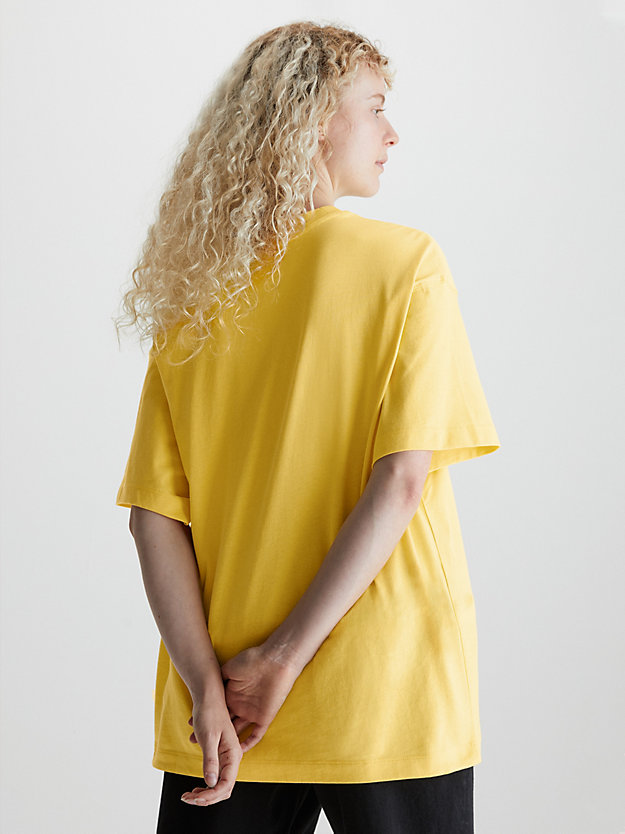 SUNLIT YELLOW T-shirt unisex oversize dla Unisex CALVIN KLEIN JEANS